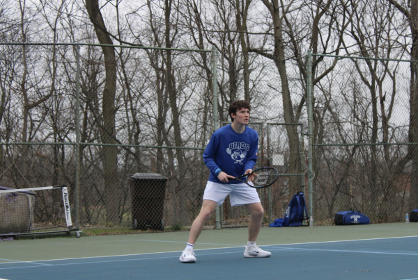 Senior Connor Wallace gets ready to begin a set.